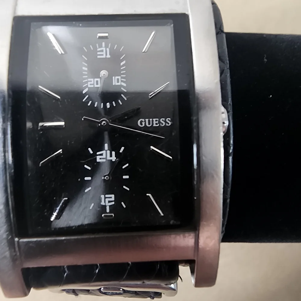 GUESS Silver and Black Unisex Watch